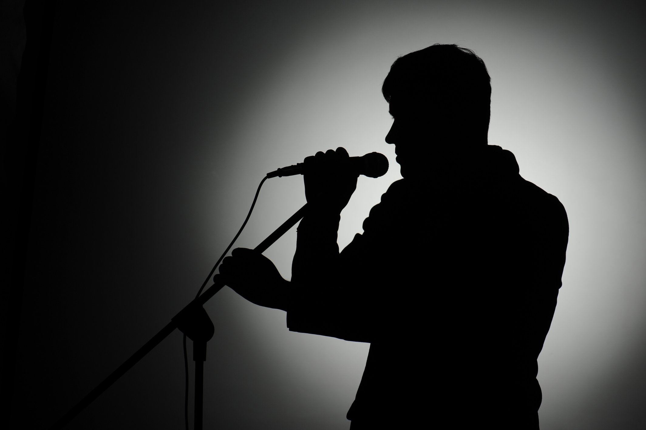 Silhouette of pop singer and presenter.